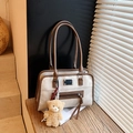 Retro cream canvas underarm bag with brown leather trim and a cute plush bear charm - With Pendant / Off White