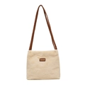 Fuzzy cream plush bucket tote bag with brown straps and center fashion patch - One Size / Off White