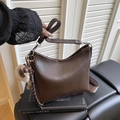 Dark brown leather crescent bag with wide woven strap and cute plush bear charm decoration - With Pendant / Brown
