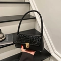 Elegant black underarm bag with crocodile pattern flap and golden metal buckle - Black