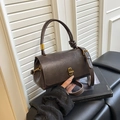 Fashionable dark brown crossbody bag with gold buckle and adjustable strap - Brown