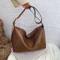 Brown faux leather tote bag with large capacity and golden hardware on wide strap - Brown