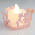 Pink laser-cut paper candle wrap with couple silhouette and warm white LED tea light - Pink