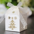 White laser-cut Christmas candy box with tree and snowflake patterns and ribbon - Ivory