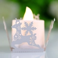 Christmas reindeer and snowflake laser-cut candle wrap with warm LED tea light - White