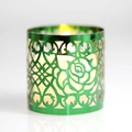 Green metal hollow candle holder with rose laser cut pattern and warm candlelight - Double-Sided Reflective Green