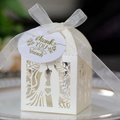 Laser cut white wedding favor box with heart patterns and gold thank you tag - Ivory