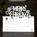 White laser cut Christmas seat card with snowflakes and Merry Christmas镂空 lettering - White