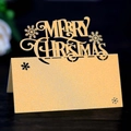 Laser cut gold Christmas seat card with Merry Christmas letters and snowflake design - Gold
