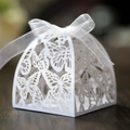 Laser cut white butterfly candy box made of pearlescent paper with white ribbon bow - White