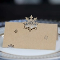 Marque-place en papier kraft brun avec flocon de neige découpé au laser pour table de Noël - Papier kraft