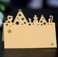Marque-place de Noël doré découpé au laser avec bonhomme de neige et sapin évidé - Or