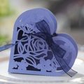 Periwinkle blue heart-shaped laser cut favor box with rose patterns and navy ribbon bow - Sapphire Blue