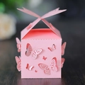 Elegant laser-cut pink butterfly paper candy box with intricate floral hollow design for weddings - Pink