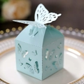 Light blue laser-cut candy box featuring 3D butterfly lid for wedding favors - Pearl Pale Blue