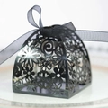 Elegant black laser-cut wedding favor box with floral patterns and organza ribbon bow - Reflective Black