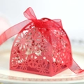 Laser cut red wedding candy box with heart patterns and a red satin ribbon bow - Pearlescent Red