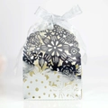 Laser-cut silver hollow candy box with floral patterns and a light silver silk ribbon - Reflective Silver