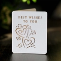 Tarjeta de felicitación cortada con láser con texto Best Wishes y motivos de corazón en blanco - Blanco