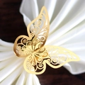 Elegant gold butterfly napkin ring with intricate laser-cut floral patterns for table decor - Mirror Gold