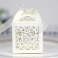 Elegant white laser-cut wedding favor box with rose patterns and white organza ribbon - Ivory