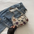 Beige woven canvas shoulder bag with vintage floral print and crescent moon shape - Dark Floral