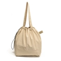 Minimalist beige nylon bucket tote bag with adjustable drawstring and long shoulder strap - Khaki