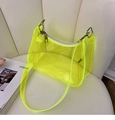 Close-up of fluorescent yellow transparent PVC hobo bag with silver metal zipper detail - Yellow