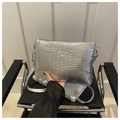 Detailed view of silver crocodile texture faux leather bag with golden metallic zipper - Silver