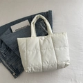 Quilted white nylon puffer tote bag with snap closure in a minimalist autumn style - White