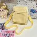 Japanese style yellow nylon crossbody bag with clear PVC pocket for anime pins - Yellow