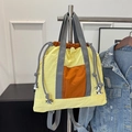 Yellow and orange two-tone waterproof nylon backpack with drawstring and top handle - Yellow
