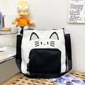 Bolso de lona blanco y negro con diseño de orejas de gato y correa ancha ajustable - Negro