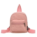 Pink minimalist nylon mini backpack for women with front zipper pocket and sleek design - Pink