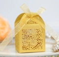 Elegant laser-cut hollow candy box in bright gold finish with light gold ribbon - Gold