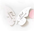 White butterfly paper place card with Eid Mubarak print for festive table decor - Ivory