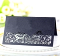 Elegant laser cut black wedding place cards with intricate floral patterns for guest seating - Black