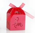 Red hollow-out LOVE candy box with pearlescent finish and red organza ribbon bow - Pearlescent Red