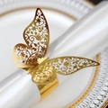 Elegant rose gold butterfly napkin ring with intricate hollow carved design for wedding decor - Reflective Gold