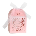 Pink laser-cut hollow floral wedding favor box with a white organza ribbon bow - Pink
