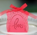 Pink laser-cut wedding favor box with Love hollow pattern and red silk ribbon bow - Pearlescent Red