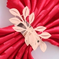 Elegant rose gold hollow leaf metal napkin ring on a red silk fabric background - Mirror Rose Gold