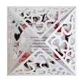 White laser-cut lace wedding invitation with intricate floral hollow pattern - White