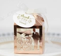 Rose gold laser-cut wedding favor box with bride groom silhouette and white ribbon tie - Reflective Rose Gold