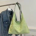 Minimalist light green tote bag with pleated texture and fashion triangle logo detail - Green
