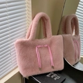 Pink plush tote bag with soft faux fur texture and woven rope detail for women - Pink