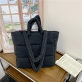 Quilted black puffer tote bag with dual straps for shoulder and hand carry use - Black