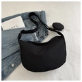 Detail of black nylon crescent crossbody bag with adjustable strap and small coin pouch - Black