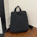 Zaino minimalista in nylon nero da donna con manico largo e grande capacità interna - Nero