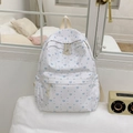 White casual student backpack with blue heart patterns and spacious zipper pockets - White